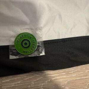 Green and Black Impact in Iteration Hat Pin